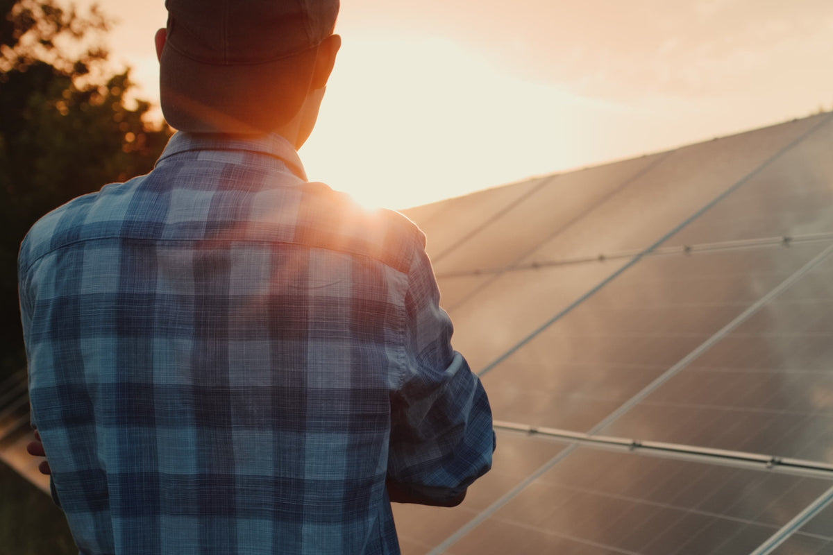 Commercial rooftop solar panel installation at sunrise in Sonoma County business park