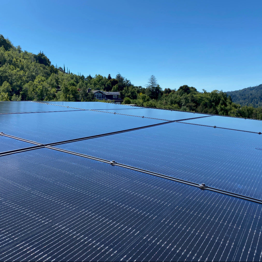 Solar Panels on the roof with Mountain Background