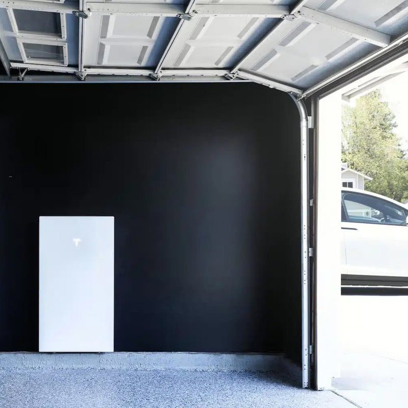 Tesla vehicle charging from solar-powered wall connector at Marin County home