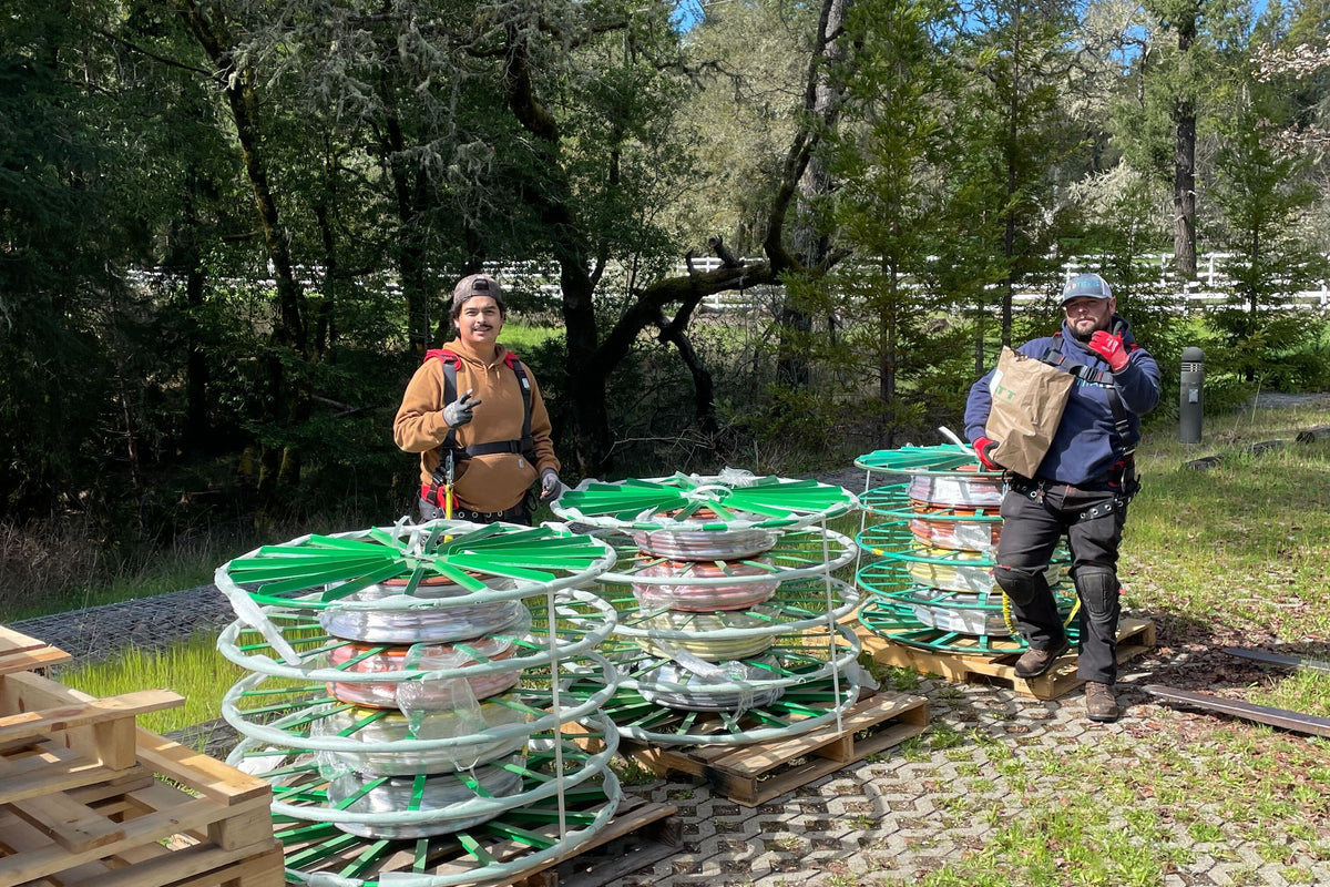 unpacking many spools of wiring